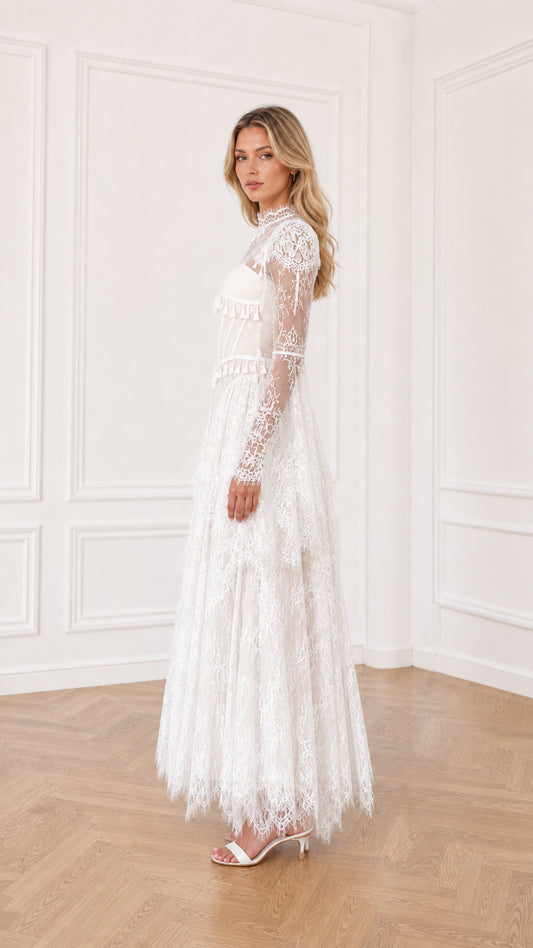 White lace evening gown with tiered skirt side view